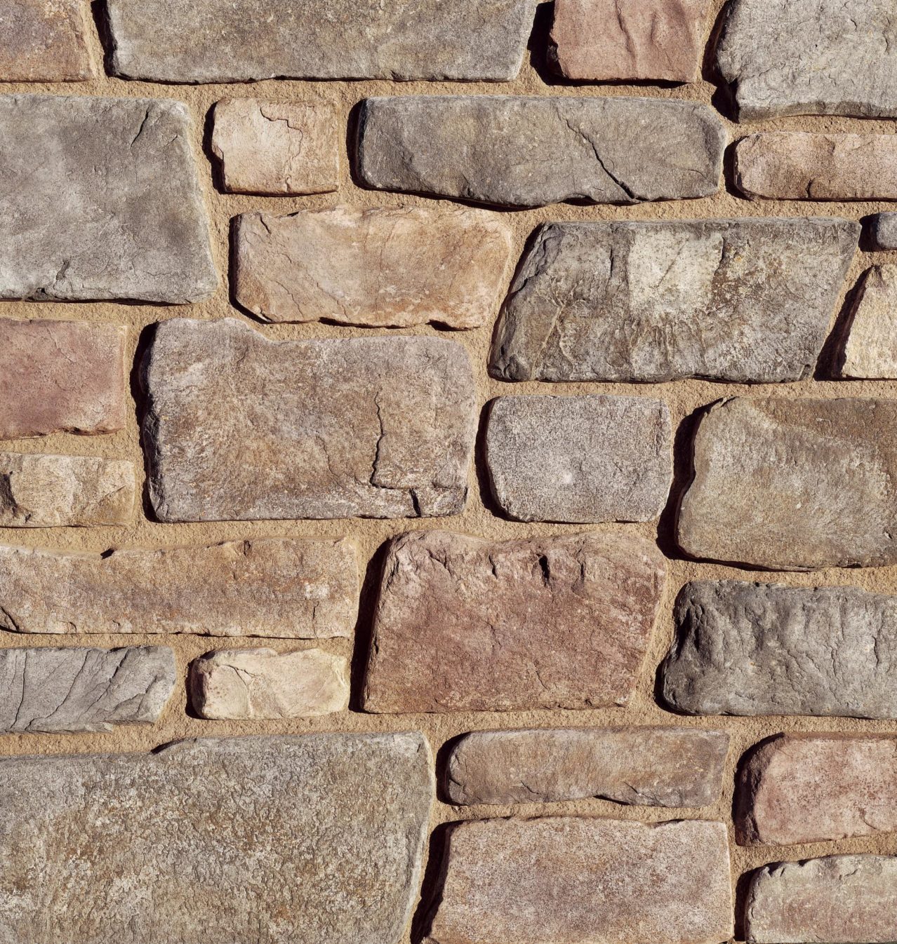 Fieldledge is a hybrid of horizontally oriented fieldstones and ledge stones. The stone’s old world quality and smoother face transitions between a rustic look and an articulated ledge. Fieldledge’s color palettes range from cool to warm gray blends. Its sepia base and raw linen color is complemented by subtle khaki-greens and olives, warm ochres, chestnut browns and raw umber. Corners available. HEIGHT: 1.5"–8" | LENGTH: 4"–19" | THICKNESS: .5"–2"
